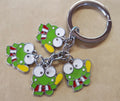 4 charmed frog keyring