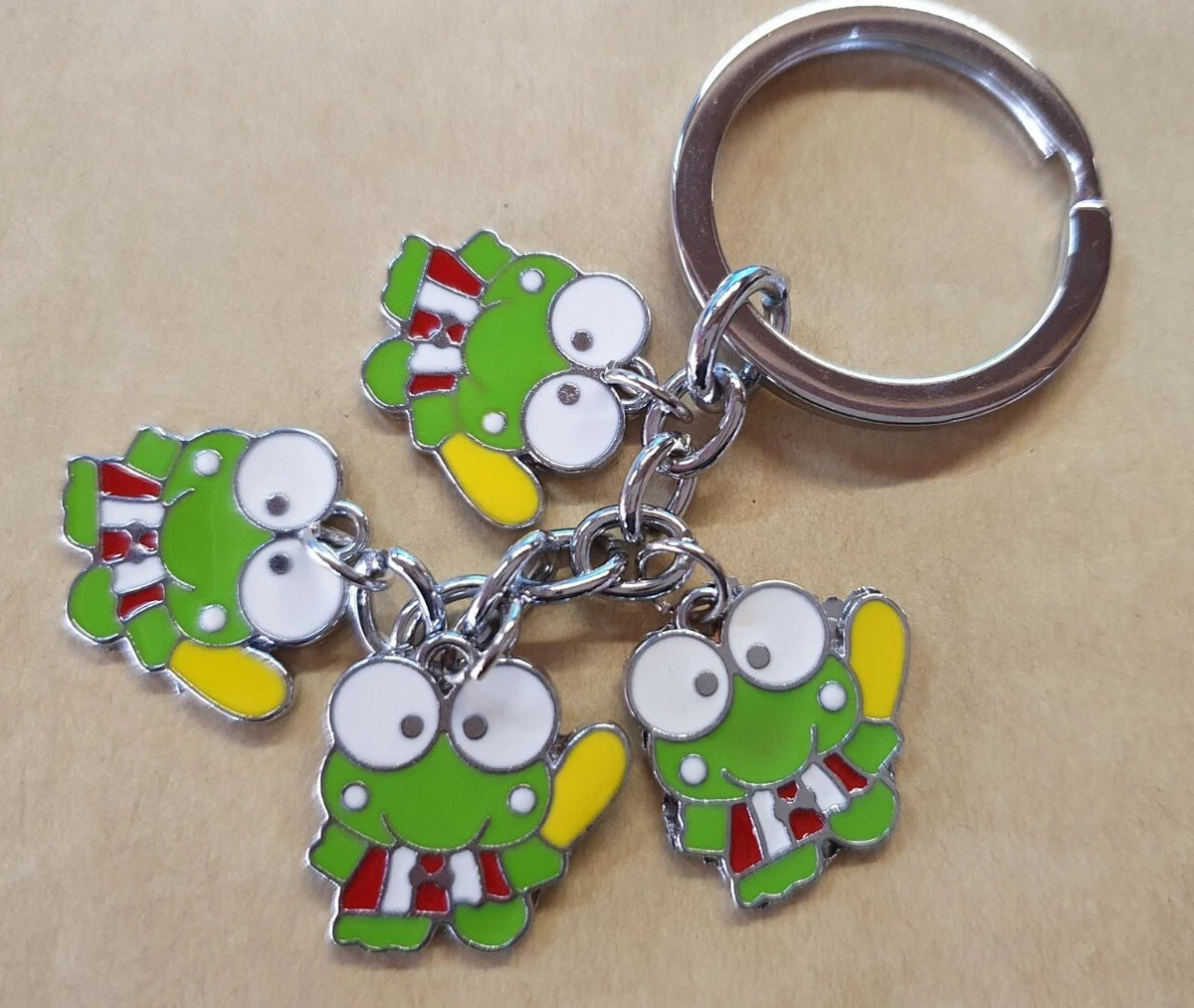 4 charmed frog keyring